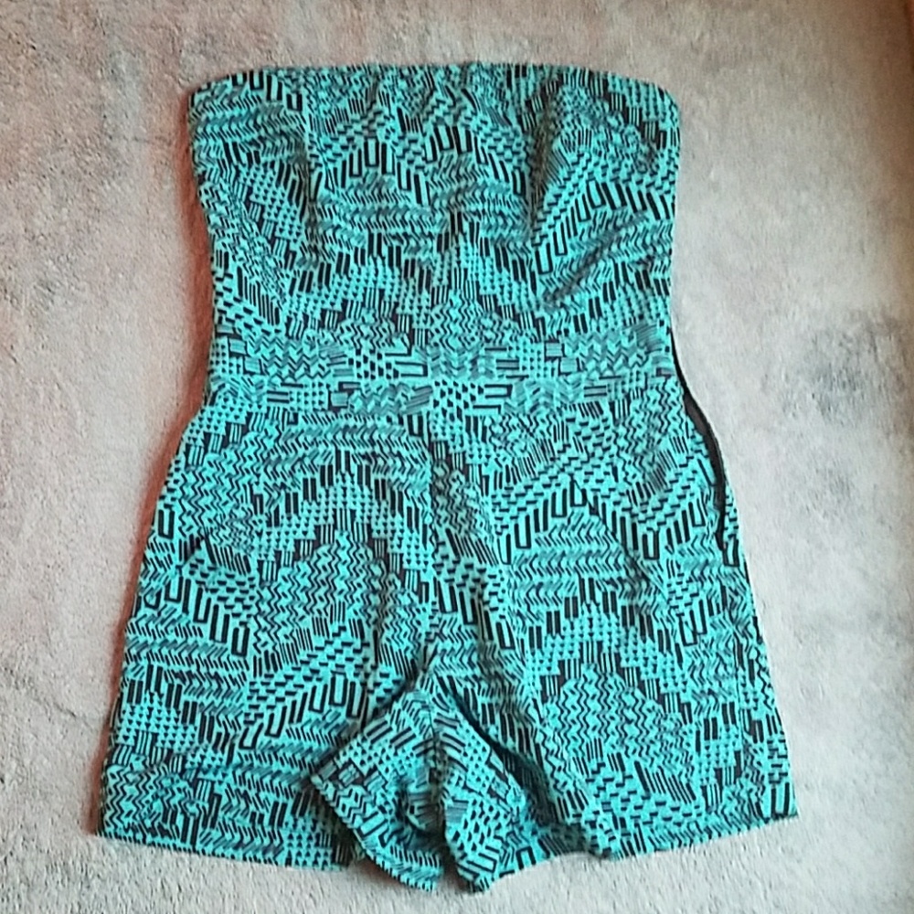 Green romper.